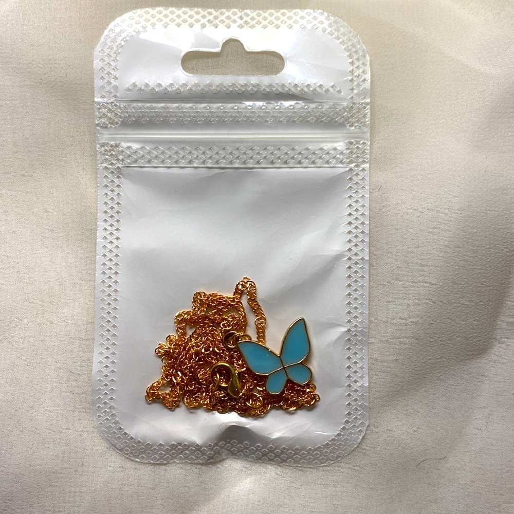Blue butterfly necklace